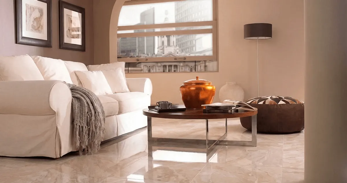 Modern living room with professionally installed marble flooring, a beige sofa, coffee table in Indianapolis, IN